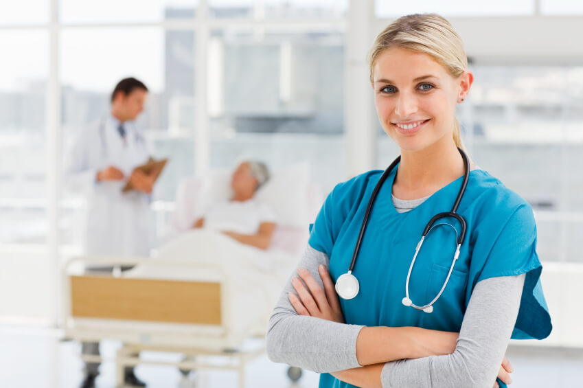 Nurse in front of a patient and doctor