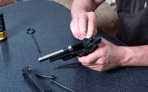 gunsmith assembling a gun