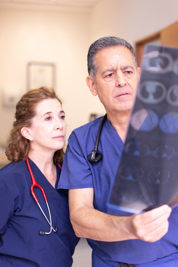 LPN and MD checking x rays