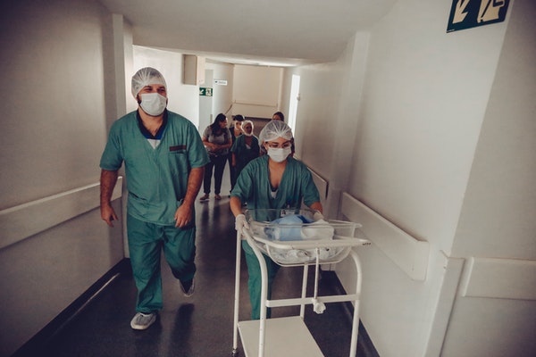 two CNAs working at the hospital