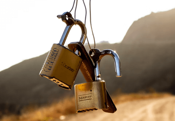 two unlocked locks hanged
